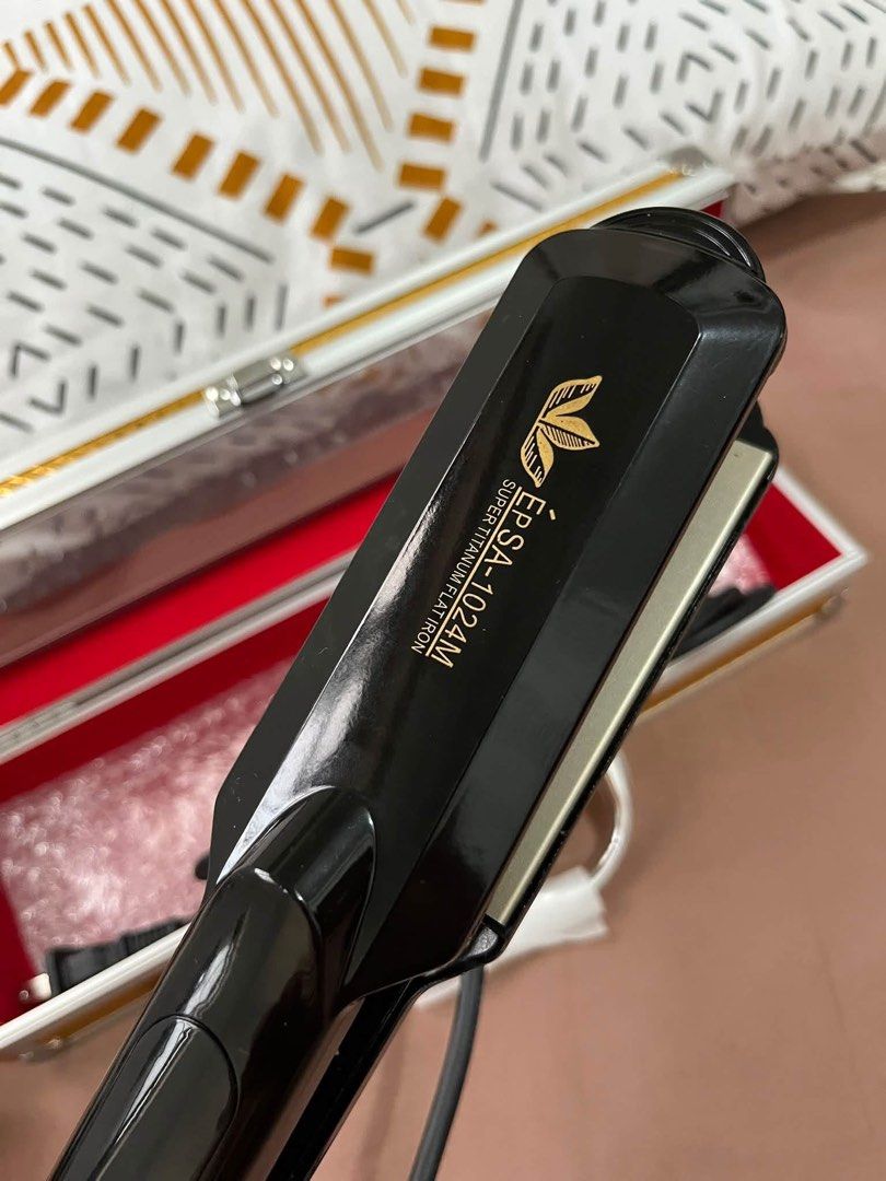 ÉPSA Professional Super Titanium Flat Iron EPSA-1024M (Category: Hair) located in Bacoor. Submitted by queenkwens21 (Listing ID 1468849002, Image 1). Description: - Brand: ÉPSA Professional Hair Straightener - Features: Super titanium plates for fast, smooth styling with side power and temperature adjustment - Condition: Excellent, well-maintained, brandnew.