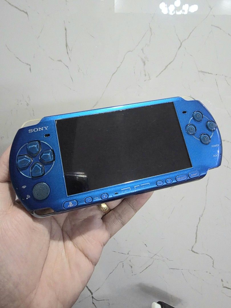 PSP 3000 Slim Vibrant Blue Handheld Console (Category: PlayStation) located in Mandaluyong City. Submitted by chan.ningtatum (Listing ID 1468769928, Image 1). Description: For Sale! PSP 3000 Slim Playstation Portable - Color: Vibrant Blue - Condition: Fully tested, powers on, and works great with normal signs of handling - Features: Functional buttons, analog stick, screen, and secure UMD door - Ideal for: Retro gaming enthusiasts Jailbreak Insta