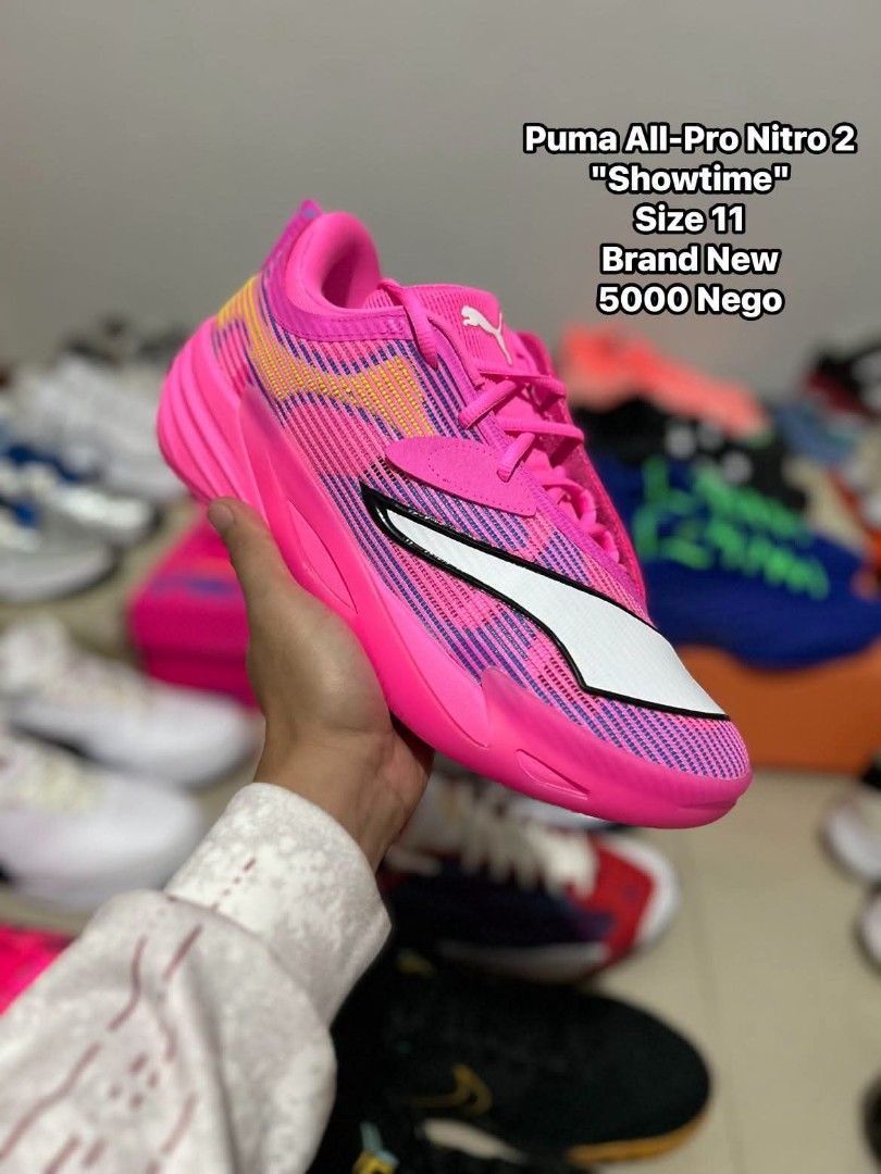 Puma All-Pro Nitro 2 Showtime Size 11 (Category: Sneakers) located in Quezon City. Submitted by bertsonamilasolidshoes (Listing ID 1468922004, Image 1). Description: - Brand: Puma All-Pro Nitro 2 - Colorway: Showtime (Bright pink upper, purple stripes, yellow gradient, white formstrip) - Size: 11 US Men's - Condition: Brand new, unworn with clean soles and crisp laces - Performance: High responsiveness and excellent impact protection.