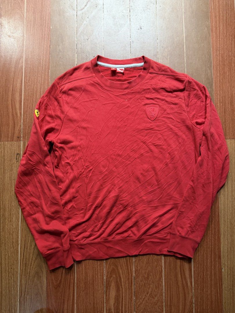 Puma Ferrari Red Sweatshirt Crewneck (Category: Coats, Jackets and Outerwear) located in Dasmarinas. Submitted by kylebecker (Listing ID 1468927340, Image 1). Description: - Brand: Puma x Scuderia Ferrari - Item: Red crewneck sweatshirt - Fit: Classic sporty fit - Details: Tonal Ferrari shield logo on the chest, small yellow Scudetto badge on the right sleeve - Features: Ribbed cuffs and hem, clean interior collar tag - Condition: Excellent, grea