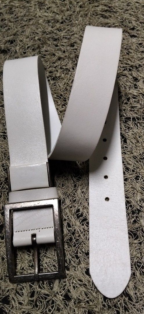 PURE SOLID GUINE IVORY WHITE LEATHER BELT UNISEX with Rectangular Buckle (Category: Activewear) located in Paranaque City. Submitted by michael-08 (Listing ID 1468832650, Image 2). Description: - Color & Material: Clean white leather - Hardware: Sturdy silver-tone chunky rectangular buckle - Fit: Five punched holes for easy adjustment - Style: Versatile everyday accessory - Pairing: Great for casual denim or tailored trousers PURE SOLID GENUINE I