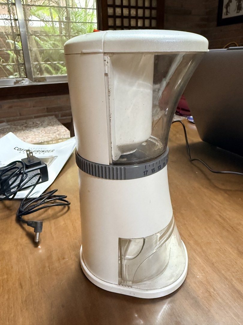 PureFresh Electric Coffee Grinder (Category: Coffee Machines & Makers) located in Quezon City. Submitted by bluginge (Listing ID 1468783723, Image 2). Description: - White - Ceramic conical burr with 17 grind settings - Used to grind whole beans for french press, but I now have an espresso machine set up so I needed another kind of grinder - Includes standard wall adapter and sealed car cigarette lighter adapter cable - Includes instruction manua