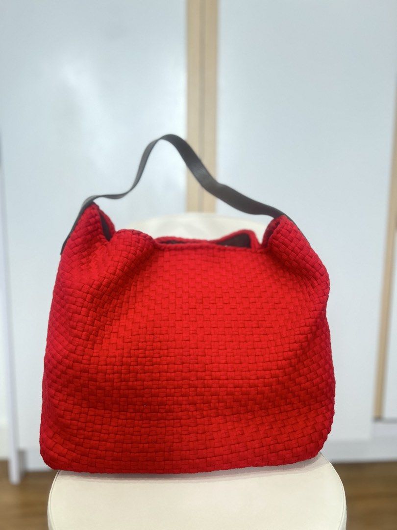 R2R x Aranaz Red Buslo Bag (Category: Shoulder Bags) located in Quezon City. Submitted by ninanicetohave (Listing ID 1468748118, Image 1). Description: - Brand: Aranaz - Color: Bright red buslp woven design with dark brown leather handles and base, weaves are all still intact - Interior: Brown fabric lining with zipper pocket and two open pockets - Closure: Secure magnetic snap closure - Size: Approx. 16 inches across, Handle drop around 8 inches