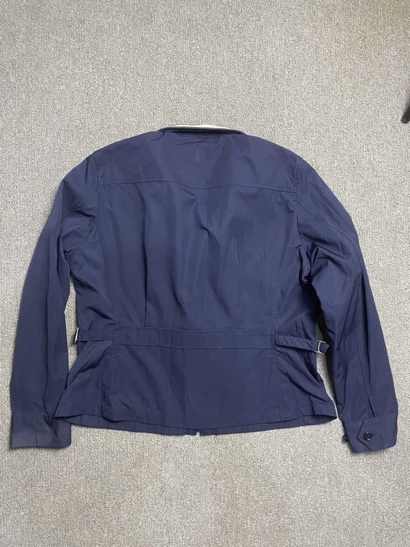 Ralph Lauren Golf Navy Zip Jacket Size L (Category: Longsleeves) located in Quezon City. Submitted by cozy_thrifting (Listing ID 1468741363, Image 3). Description: - Brand: Ralph Lauren Golf - Item: Zip-up Jacket - Color: Navy Blue - Size: Large (L) - Material: 100% Polyester - Closure: Zip front with custom branded puller tab - Collar: Ribbed with contrast piping detail - Pockets: Two front angled welt pockets - Details: Adjustable side waist ta