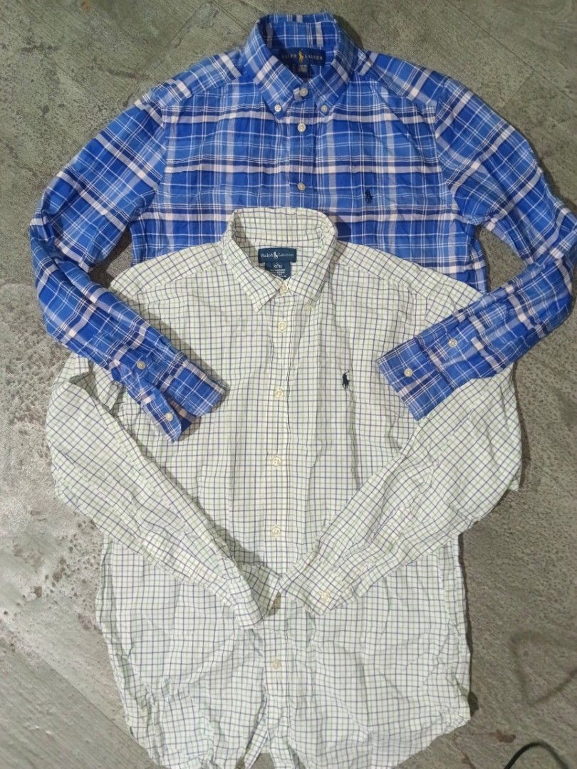 Ralph Lauren Plaid Button-Down Shirts Bundle 2pcs (Category: Tshirts & Polo Shirts ) located in Carcar. Submitted by rolandobac92675 (Listing ID 1468748039, Image 3). Description: - Brand: Ralph Lauren - Size: Boys L (14-16) - Quantity: Bundle of 2 shirts (Blue plaid, White and green plaid) - Features: Button-down collars, classic fit, embroidered chest pony logo - Material: Premium quality cotton - Condition: Excellent casual wear options.