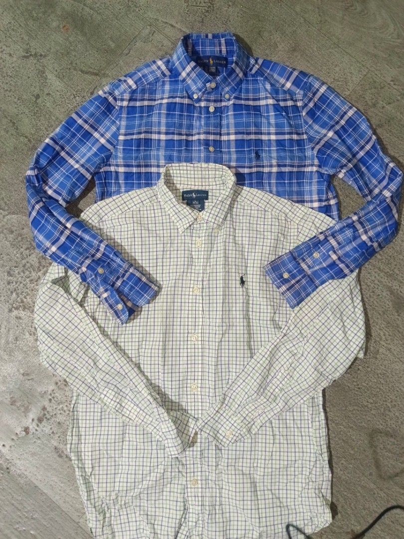 Ralph Lauren Plaid Button-Down Shirts Bundle 2pcs (Category: Tshirts & Polo Shirts ) located in Carcar. Submitted by rolandobac92675 (Listing ID 1468748039, Image 2). Description: - Brand: Ralph Lauren - Size: Boys L (14-16) - Quantity: Bundle of 2 shirts (Blue plaid, White and green plaid) - Features: Button-down collars, classic fit, embroidered chest pony logo - Material: Premium quality cotton - Condition: Excellent casual wear options.