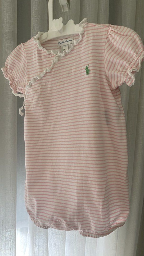 ralph lauren romper (Category: Babies & Kids Fashion) located in Manila. Submitted by louiesalvador (Listing ID 1468716724, Image 1). Description: • brand: ralph lauren • size: 9 months on tag • light pink and white stripes • side wrap style with tie closure and snap buttons for easy diaper changes • white lace trim on the collar and opening, ruffled short sleeves, and small green embroidered logo on the chest.