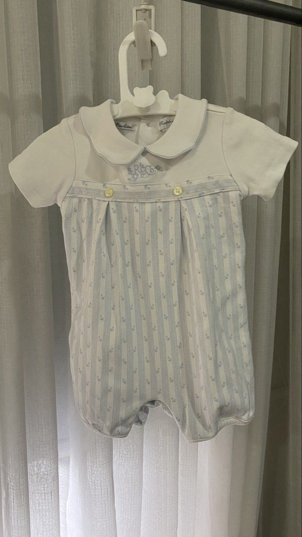 ralph lauren romper (Category: Babies & Kids Fashion) located in Manila. Submitted by louiesalvador (Listing ID 1468716723, Image 1). Description: • brand: ralph lauren • size: 9 months on tag • ultra-soft pima cotton for baby's comfort • white and light blue with vertical stripes and sailor-style collar with blue trim • cute blue anchor prints, embroidered RL & Co logo on the chest, and two small yellow front buttons.