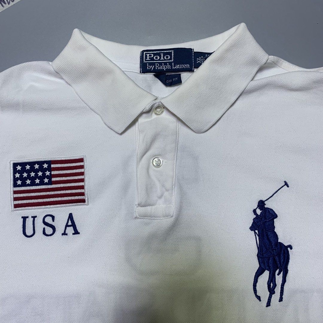 RALPH LAUREN USA POLO (Category: Tshirts & Polo Shirts ) located in Cabanatuan. Submitted by _w2keed (Listing ID 1468824058, Image 3). Description: Size: XL (W23' x L30'-31') Condition: 9/10 Color rate: 9.5/10 Issue/s: light yellow stain, fade on #3, 1 pinhole.