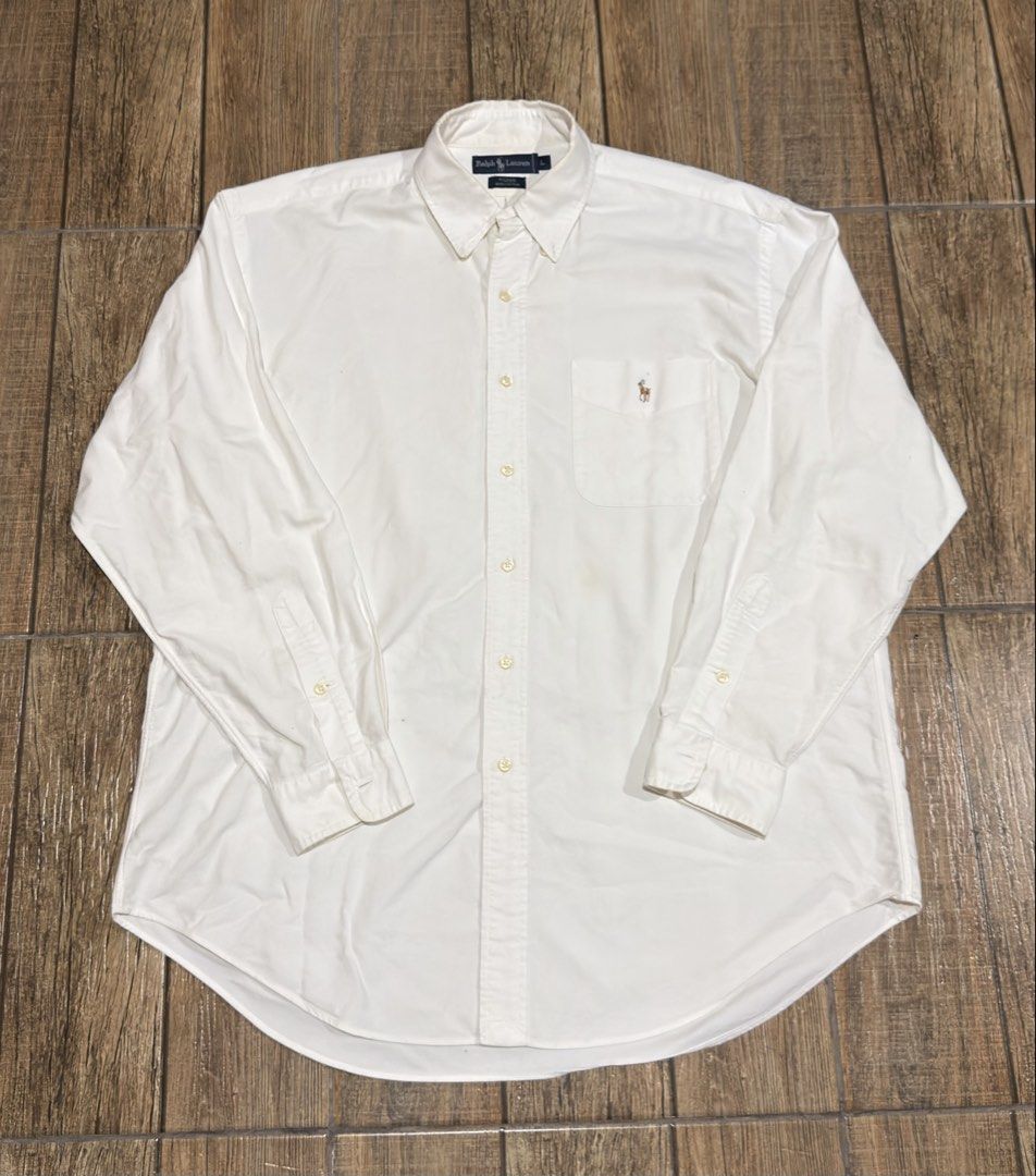 RALPH LAUREN WHITE POLO LONGSLEEVE (Category: Formal Shirts) located in Manila. Submitted by urban.vintage (Listing ID 1468873314, Image 1). Description: ISSUE: WASHABLE STAINS (NEED WASH) MOP :GCASH (NO COD) SHIP VIA: LALAMOVE & J&T LOCATION: PASIG CITY LENGTH: 32 WIDTH : 27.
