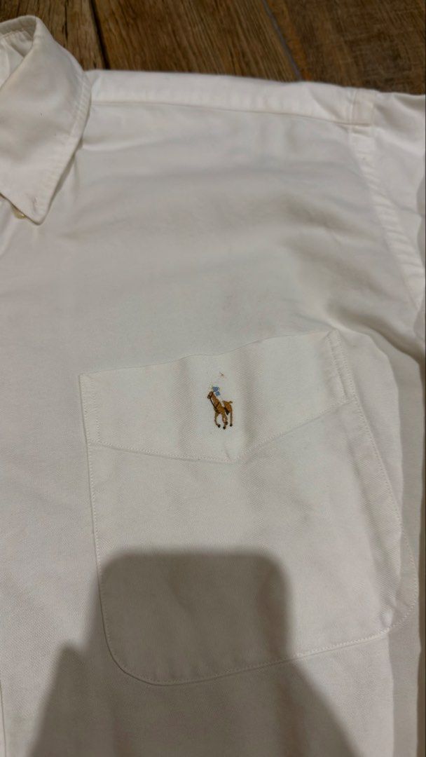 RALPH LAUREN WHITE POLO LONGSLEEVE (Category: Formal Shirts) located in Manila. Submitted by urban.vintage (Listing ID 1468873314, Image 2). Description: ISSUE: WASHABLE STAINS (NEED WASH) MOP :GCASH (NO COD) SHIP VIA: LALAMOVE & J&T LOCATION: PASIG CITY LENGTH: 32 WIDTH : 27.