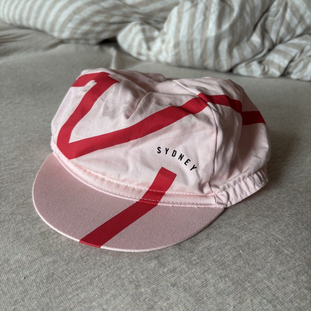 Rapha Sydney Cycling Cap - Pink Red (Category: Other Sports Equipment and Supplies) located in Paranaque City. Submitted by ngpa__ (Listing ID 1468762830, Image 1). Description: 💗 Rapha cycling cap in a pink and red design featuring Sydney and Rapha.RIDES logos. Details: * Condition: 9.5/10 - like new * Includes: Cycling cap only 📍 Location: Parañaque / Metro Manila 🚚 Shipping available at buyer’s expense Message me if interested! .