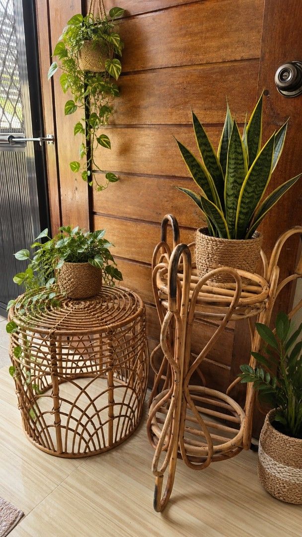 Rattan Plant Stand and Wicker Stool Set (Category: Pots & Planters) located in Antipolo. Submitted by eckaperry (Listing ID 1468738132, Image 1). Description: -TAKE ALL PLANTER AND CENTER TABLE - Matching set of 2 versatile rattan pieces - Round woven stool: perfect as a small side table or plant riser - Tall tiered stand: holds multiple pots across different levels - Natural wood tones throughout - Condition: Light wear from indoor use - Sold to