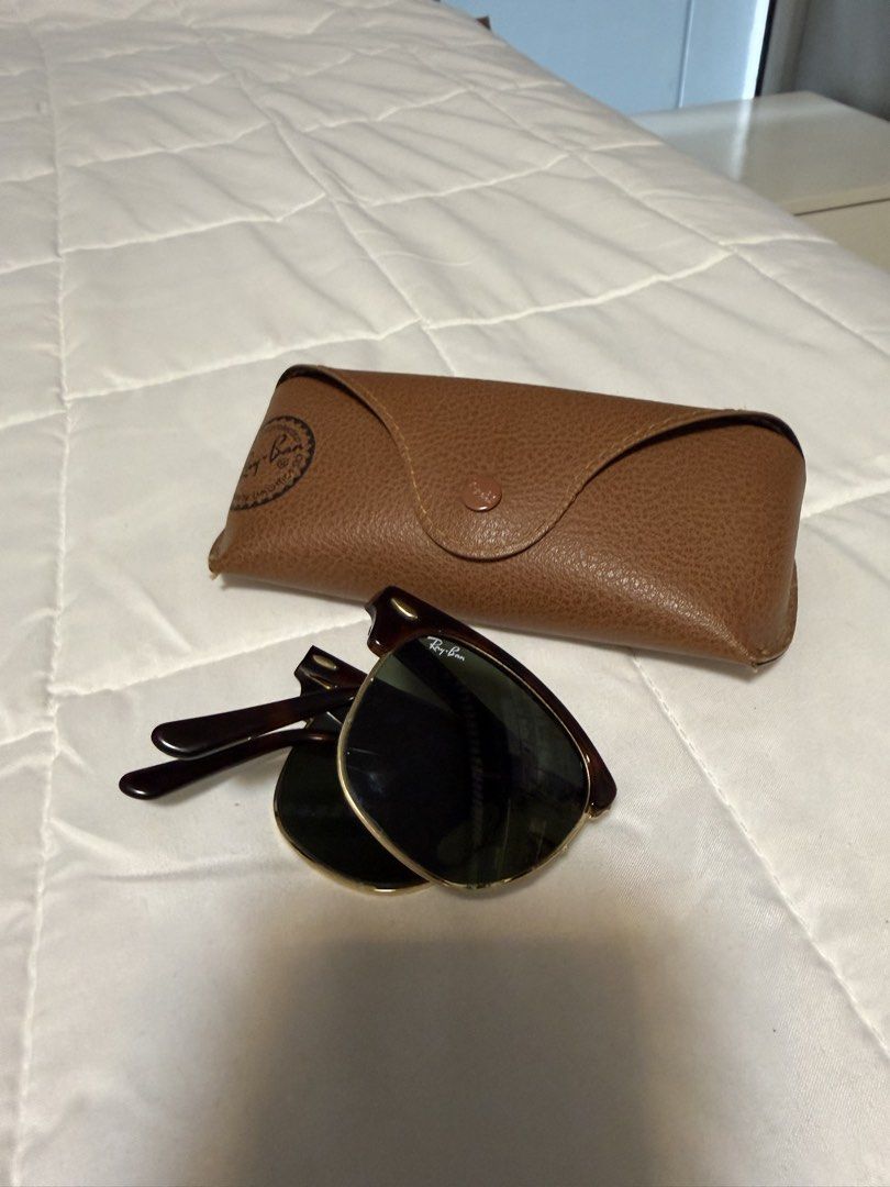 Ray-Ban Clubmaster Sunglasses with Case (Category: Sunglasses & Eyewear) located in Manila. Submitted by chanelmari19 (Listing ID 1468732237, Image 2). Description: - Brand: Ray-Ban Clubmaster - Colorway: Tortoise shell and gold frame with dark green lenses - Condition: Pristine, clean lenses with zero scratches, temple arms fold smoothly - Inclusions: Original brown leatherette hard case with snap button closure - Style: Classic browline, versat