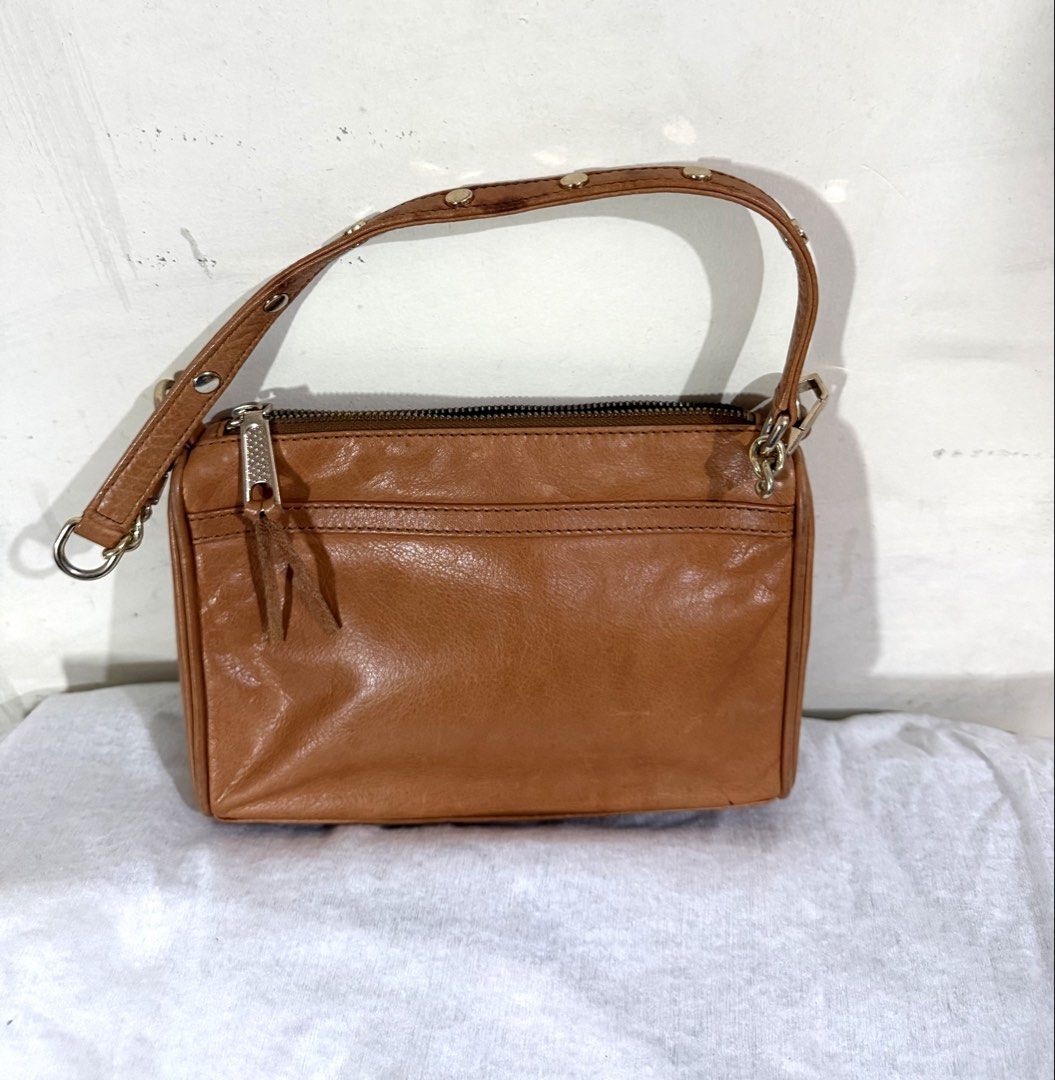 Rebecca Minkoff Shoulder Kili Bag (Category: Shoulder Bags) located in Quezon City. Submitted by vluxxe (Listing ID 1468811922, Image 3). Description: REBECCA MINKOFF SHOULDER BAG 🤎 • Cognac/caramel brown leather • Signature silver-tone hardware • Front flap pocket with signature clasp • Zip-top closure • Adjustable shoulder strap 📏 Measurements: See photos .