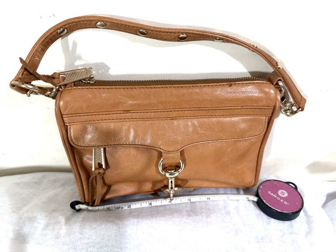 Rebecca Minkoff Shoulder Kili Bag (Category: Shoulder Bags) located in Quezon City. Submitted by vluxxe (Listing ID 1468811922, Image 2). Description: REBECCA MINKOFF SHOULDER BAG 🤎 • Cognac/caramel brown leather • Signature silver-tone hardware • Front flap pocket with signature clasp • Zip-top closure • Adjustable shoulder strap 📏 Measurements: See photos .