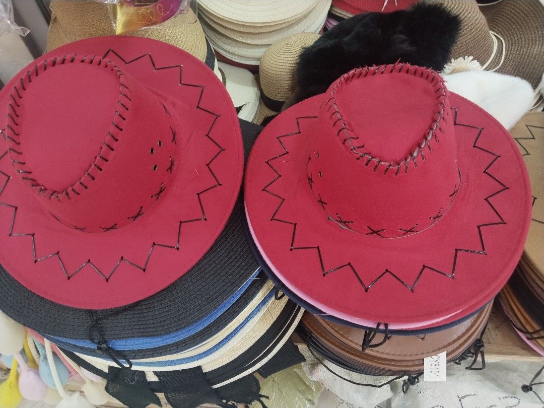 Red Cowboy Hat with Decorative Stitching (Category: Caps & Hats) located in Manila. Submitted by zdmal (Listing ID 1468773297, Image 2). Description: - Color: Vibrant red with contrasting black zigzag stitching - Style: Classic Western with a pinched crown - Design: Eye-catching and bold for any occasion - Condition: Stored neatly and carefully - Perfect for: Festivals, costumes, or statement streetwear.