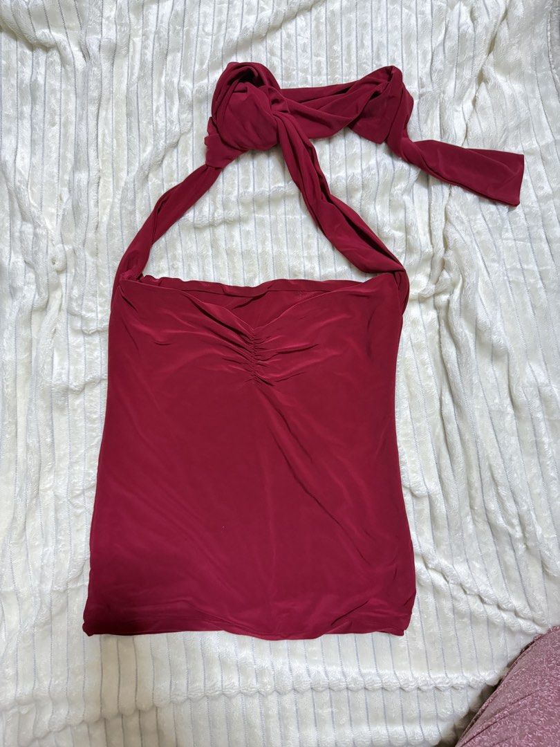 Red Halter Neck Multi-way Top With Ruched Front (Category: Sleeveless) located in Manila. Submitted by ish.core (Listing ID 1468920675, Image 1). Description: - Oasis Bella Multi-way Top - Color: Bright red - Design: Sleeveless halter top with secure back-of-neck ties, can be worn multiple ways - Detail: Flattering gathered ruched center chest - Fit: Soft, stretchy fabric that hugs the body closely - Aesthetic: Clean Girl, Rich Tita, Corporate Ch
