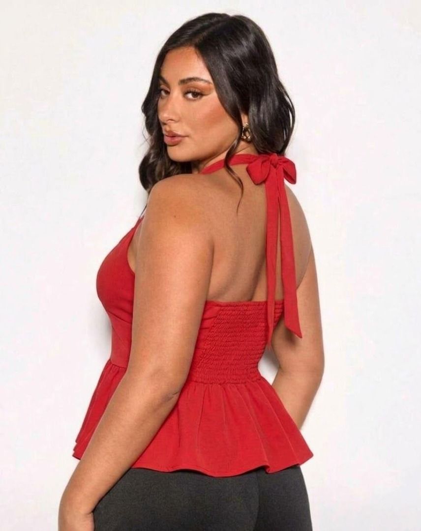 Red Halter Neck Peplum Top with Tie Back (Category: Sleeveless) located in Manila. Submitted by babeboxtheory (Listing ID 1468859594, Image 1). Description: - Color: Bright red - Style: Halter top with V-neck and structured under-bust seams - Fit: Stretchy smocked back panel and cute tie-back - Details: Flared, flowy peplum hem - Fabric: Lightweight and comfortable - Perfect for: Casual day wear or dressing up for a night out with jeans or a skir