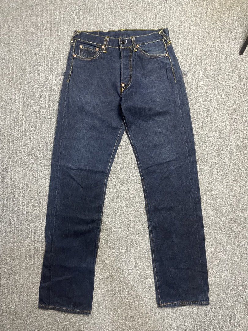 Red Monkey Company RMC Denim Jeans (Category: Jeans) located in Quezon City. Submitted by cozy_thrifting (Listing ID 1468739046, Image 1). Description: - Brand: Red Monkey Company - Material: 100% cotton raw indigo denim in dark wash - Closure: Button fly with branded copper rivets - Details: Detailed sunburst and pyramid pocket graphics with frayed edges - Features: Patterned inner pocket lining and leather back patch - Condition: Dark wash with