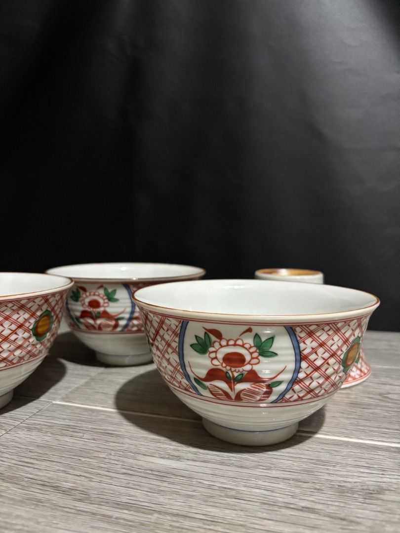 Red Oriental Bowls P75 each (Category: Dinnerware & Cutlery) located in Baao. Submitted by apr1979 (Listing ID 1468788503, Image 3). Description: - 4 pcs available. VGC. Signed - 6 x 3.4 inches - Traditional Japanese tableware design with red and blue floral patterns - Stackable to save cabinet space - Features a white exterior base with ribbed texture - Versatile size great for rice, soup, or side dishes.