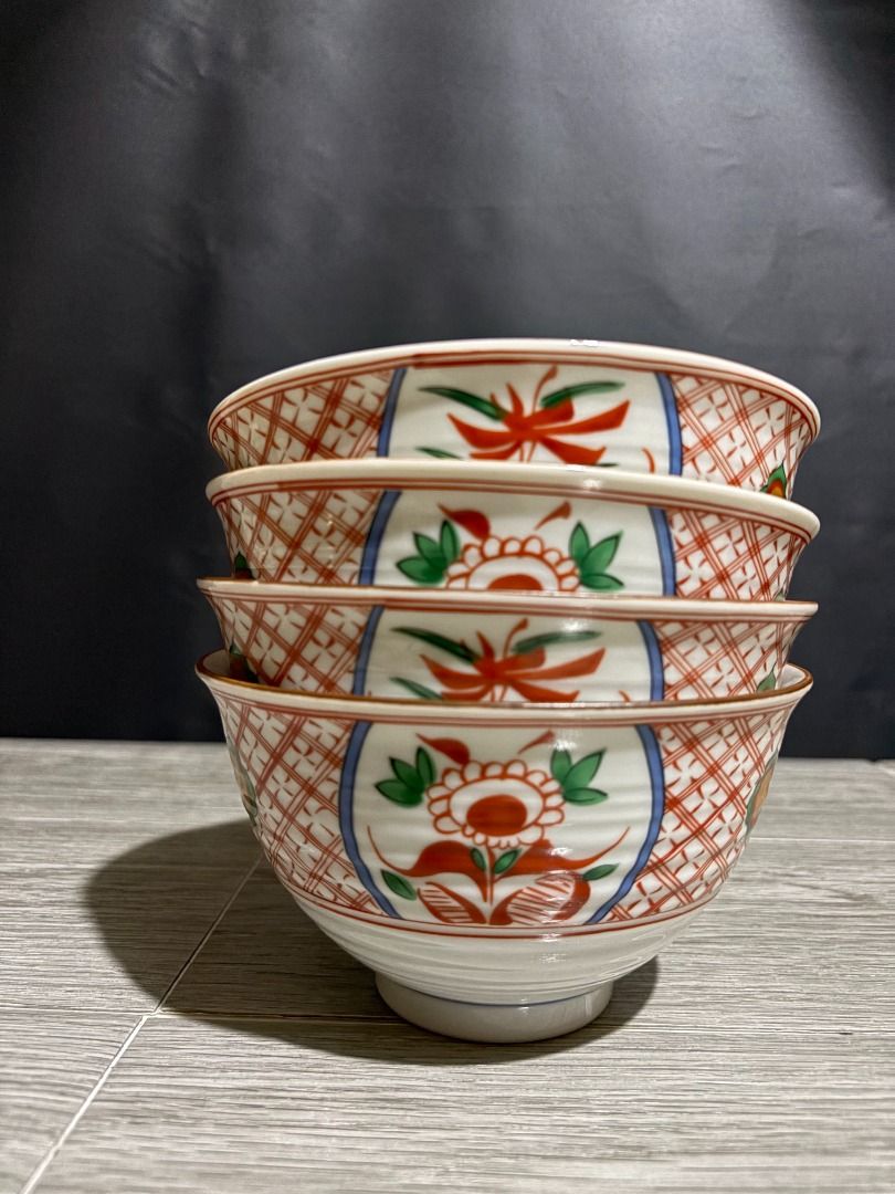 Red Oriental Bowls P75 each (Category: Dinnerware & Cutlery) located in Baao. Submitted by apr1979 (Listing ID 1468788503, Image 1). Description: - 4 pcs available. VGC. Signed - 6 x 3.4 inches - Traditional Japanese tableware design with red and blue floral patterns - Stackable to save cabinet space - Features a white exterior base with ribbed texture - Versatile size great for rice, soup, or side dishes.