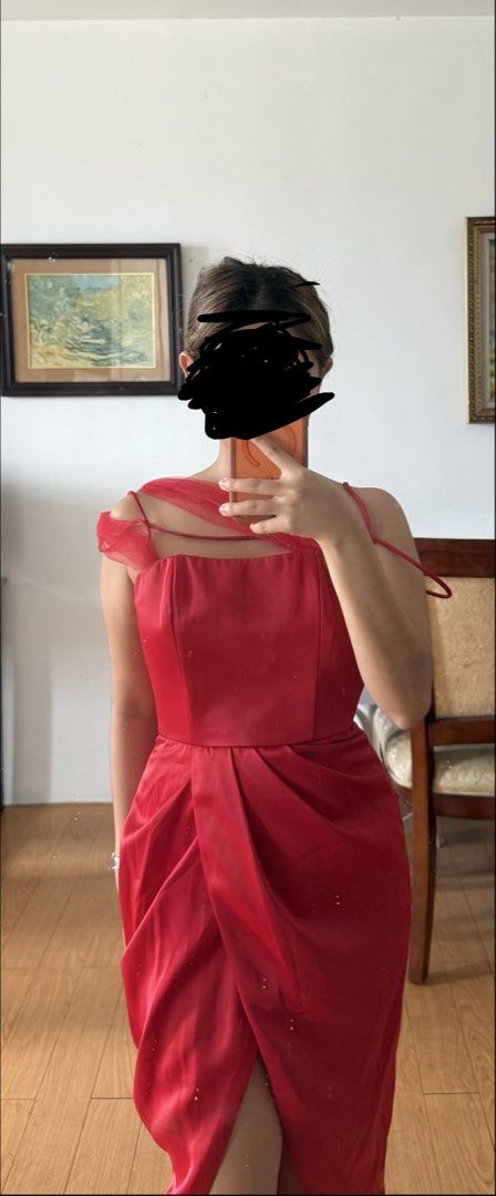 Red Satin Cocktail Dress (Category: Evening dresses & gowns) located in Manila. Submitted by expectopatronum934 (Listing ID 1468768053, Image 1). Description: - Designer: Ulysses Caragayan - Color: Bright red - Material: Heavy satin that holds its shape nicely - Size: Fits xsmal - Design: Fitted bodice, ruched skirt with front slit, delicate straps, and sheer tulle shoulder detail - Closure: Back zipper - Condition: Worn once, freshly cleaned and