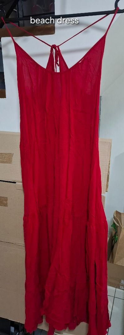 Red Beach Maxi Dress (Category: Dresses) located in Pasig City. Submitted by dripcounty (Listing ID 1468817306, Image 1). Description: Red Beach Maxi Dress ₱250 Bought in the Philippines Size: Unconfirmed — please confirm in chat Condition: Good / preloved; storage wrinkles visible. Thin straps, tie detail and flowing tiered skirt. Brand unconfirmed. Actual item shown in photos. Delivery fee shouldered by buyer (Lalamove / other courier). Item pr