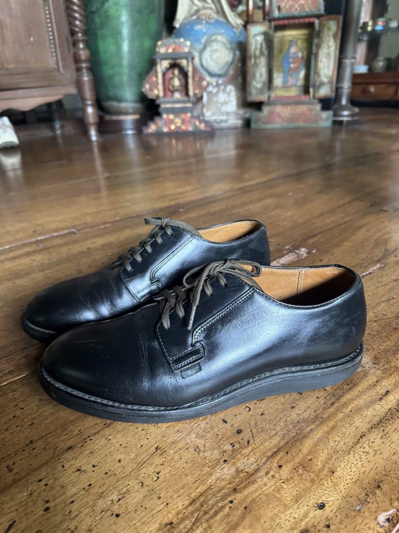 Red Wing Postman Oxford shoes (Category: Dress Shoes) located in Paranaque City. Submitted by heritagemnl (Listing ID 1468776565, Image 2). Description: - Style: Classic derby oxfords - Material: Black leather with natural creasing - Accents: Contrasting olive green laces - Comfort: Thick cushioned sole for all-day wear - Condition: Minor dirt on soles from normal use, plenty of life left - Best for: Versatile everyday footwear.