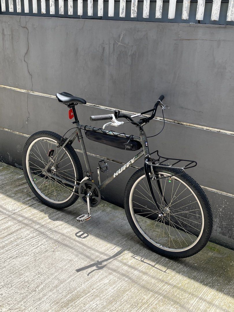 Retro Mtb 26ee (Category: Bicycles) located in Bulacan. Submitted by levidiff (Listing ID 1468719374, Image 3). Description: 1991 Huffy Stone Mountain Made in USA Retro Mtb 26er Straight geometry 20st 22tt Orig paint Size large Single speed Ratherbe klunker bars Mob top load stem Rockbros saddle Japan front rack Japan cateye rear reflector New tires 26x2.125 Frame bag and triangle reflector included Issue: Rust.