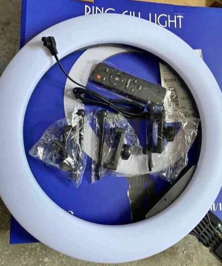 Ring Fill Light with Remote and Phone Mounts (Category: Lighting & Studio Equipment) located in Manila. Submitted by iliasjen3082126 (Listing ID 1468871343, Image 1). Description: - Large ring fill light ideal for video creation, photography, live streaming, and makeup tutorials - Adjustable warm and cool light tones to suit your desired lighting mood - Includes a convenient remote control for easy adjustments - Comes with multiple phone mounts i