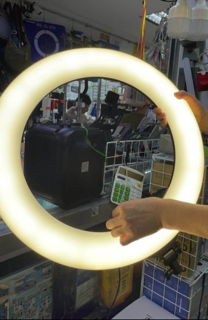 Ring Fill Light with Remote and Phone Mounts (Category: Lighting & Studio Equipment) located in Manila. Submitted by iliasjen3082126 (Listing ID 1468871343, Image 2). Description: - Large ring fill light ideal for video creation, photography, live streaming, and makeup tutorials - Adjustable warm and cool light tones to suit your desired lighting mood - Includes a convenient remote control for easy adjustments - Comes with multiple phone mounts i