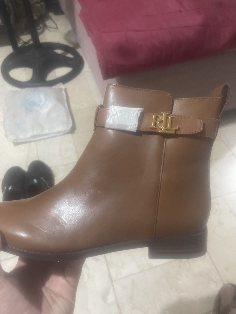 RL Classic Comfort Style Ankle Boots Tan (Category: Boots) located in Manila. Submitted by bbprelove1990 (Listing ID 1468795189, Image 3). Description: -Brand New - Brand: RL - Color: Tan - Closure: Convenient side zipper - Detail: Gold-tone RL logo buckle on side strap - Sole: Non-slip for safe walking - Comfort: Lightweight material designed for all-day wear - Versatility: Stylish for work, casual outings, or special occasions -Meet ups or Deli