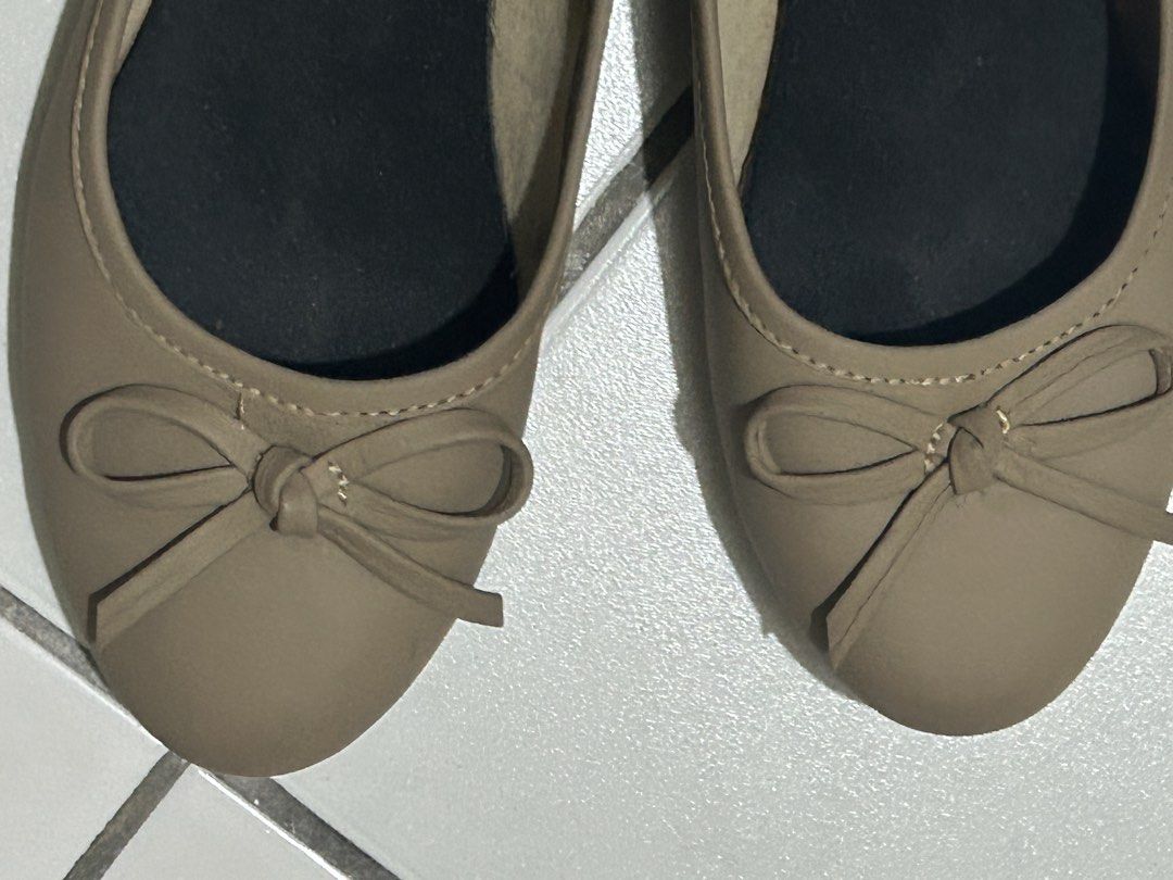 Rob & Mara Bella Ballet Flats in Beige (Category: Flats & Sandals) located in Davao. Submitted by the23rd_preloved (Listing ID 1468880016, Image 3). Description: - Brand: Rob & Mara - Bella in beige - Design: Rounded toe with a sweet front bow detail - Style: Easy slip-on design, great for work or weekend outfits - Condition: Clean, uppers in great shape, like new, barely used Brand new price at 1,990.