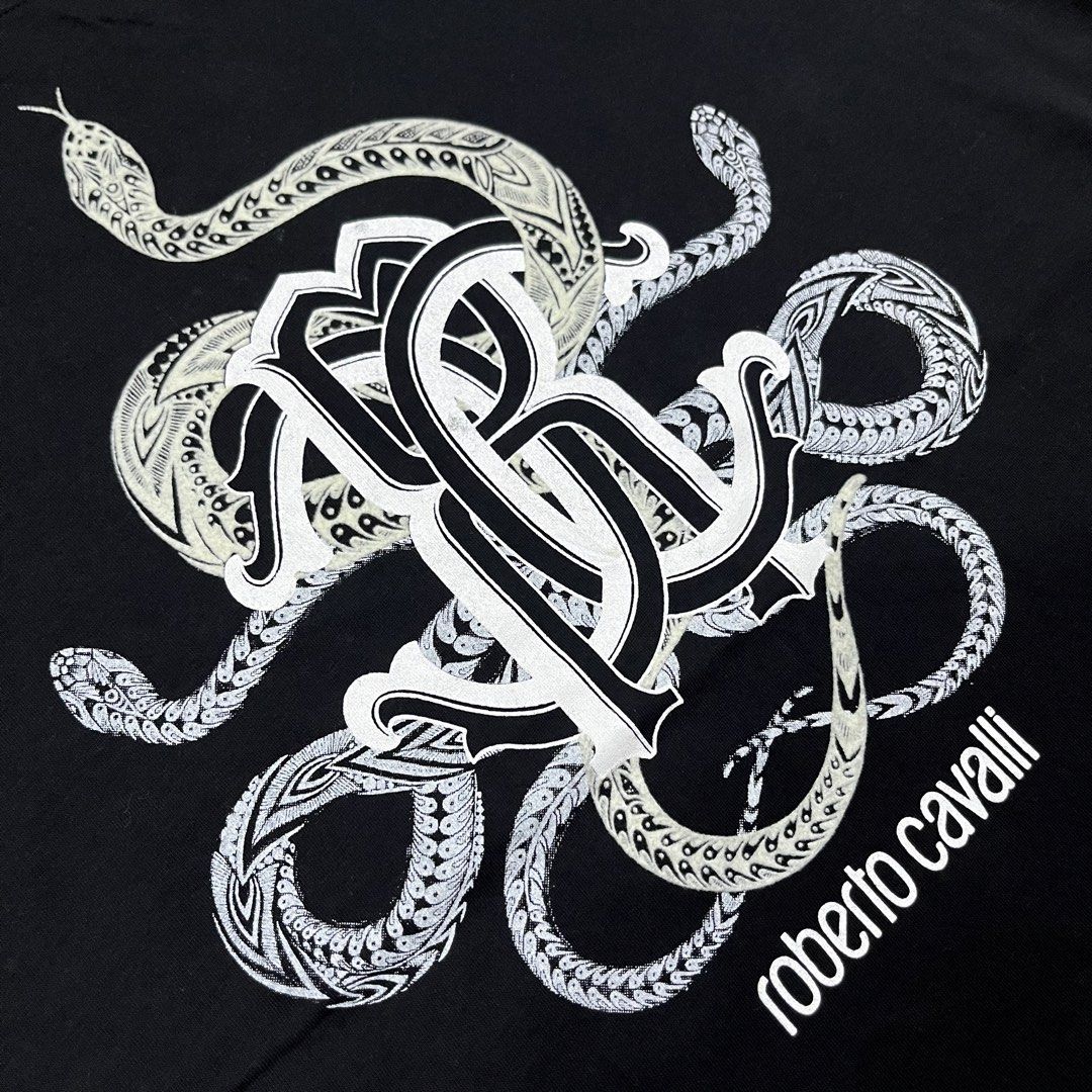 ROBERTO CAVALLI BLACK TSHIRT (Category: Luxury Apparel) located in Marikina City. Submitted by arniejane23 (Listing ID 1468881418, Image 3). Description: ROBERTO CAVALLI BLACK TSHIRT SIZE L ON TAG DIMENSION width - 21.5 length - 27.5 NO ISSUE/NO FLAWS EXCELLENT LIKE NEW CONDITION!! 📩📩📩 .