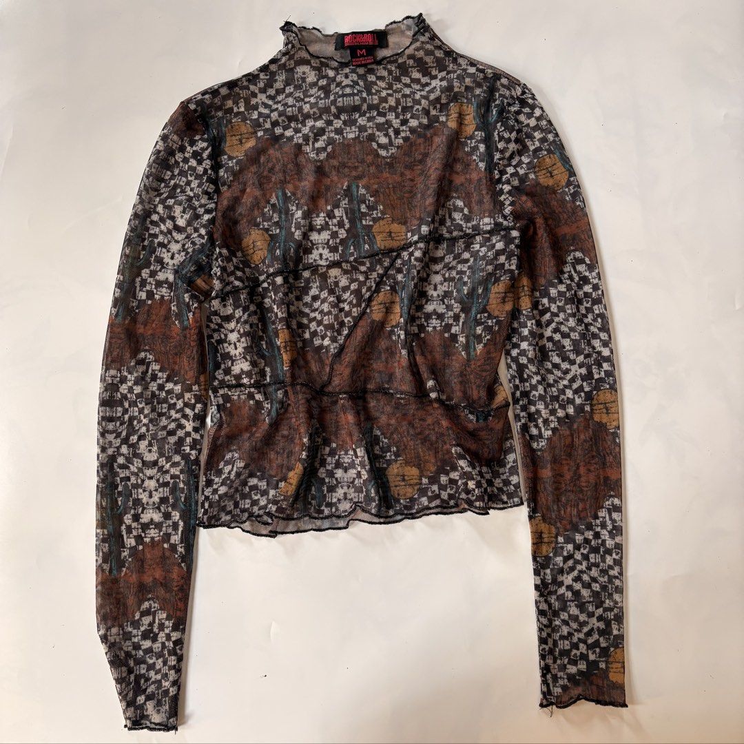 Rock&Roll mesh longsleeves top (Category: Longsleeves) located in Quezon City. Submitted by kaelian_couture (Listing ID 1468820187, Image 1). Description: .