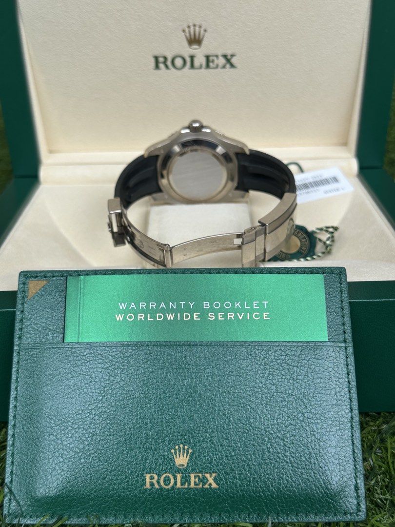 Rolex Yacht-Master 42 White Gold Black Rubber Watch M226659-0002 (Category: Watches) located in Singapore. Submitted by kaka.ong (Listing ID 1468744297, Image 3). Description: - Model: Rolex Yacht-Master 42 in 18k white gold - Dial: Black dial with round hour markers and 3 o'clock date window - Bezel: Rotating bezel with raised numerals - Strap: Black rubber Oysterflex strap with folding clasp - Includes: Green box, warranty booklet, hang tag, an