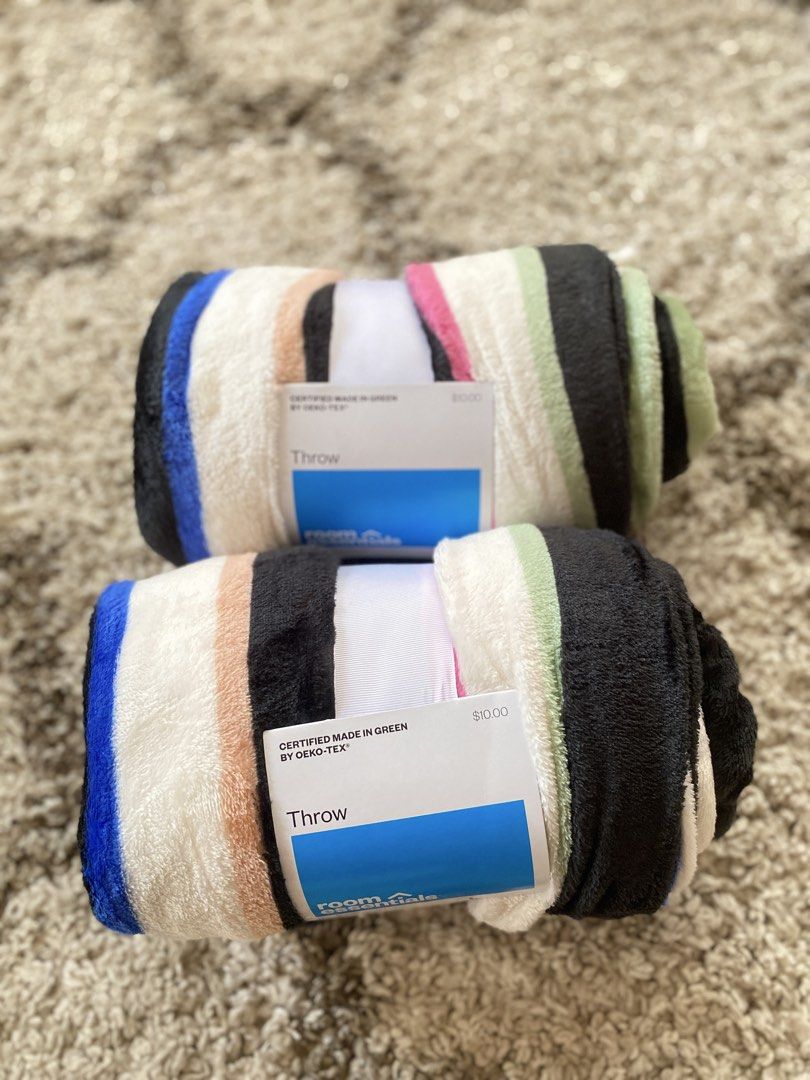 Room Essentials Rolled Throw Blanket Oeko-Tex Certified (Category: Bedding & Towels) located in Batangas. Submitted by lux_kimmy (Listing ID 1468840335, Image 3). Description: Room Essentials rolled throw blankets - Brand new with original store tags still attached - Material: 100% recycled polyester (eco-friendly) - Design: Stylish striped pattern in black, white, blue, green, and pink - Easy care: Machine washable on a normal cycle - Certified 
