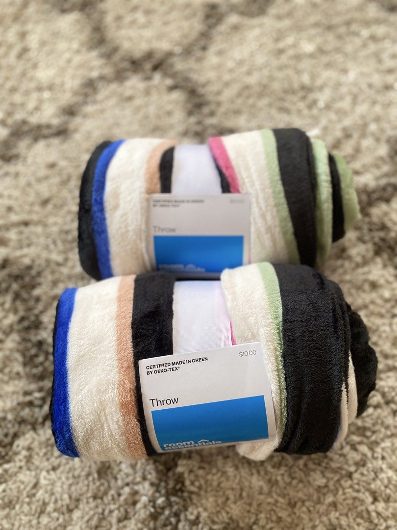 Room Essentials Rolled Throw Blanket Oeko-Tex Certified (Category: Bedding & Towels) located in Batangas. Submitted by lux_kimmy (Listing ID 1468840335, Image 1). Description: Room Essentials rolled throw blankets - Brand new with original store tags still attached - Material: 100% recycled polyester (eco-friendly) - Design: Stylish striped pattern in black, white, blue, green, and pink - Easy care: Machine washable on a normal cycle - Certified 