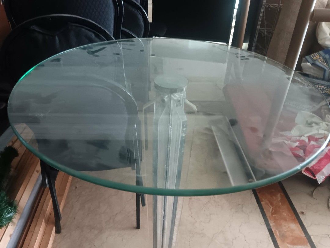 Round glass top accent table with clear column base (Category: Tables & Sets) located in Las Pinas. Submitted by jesus1smysavi0r (Listing ID 1468745074, Image 1). Description: - Round glass top table with unique clear acrylic and metal support - Sturdy chrome-finished base for stability - Compact footprint, ideal for corners and tight spaces - Great for casual dining nooks or corner displays - Easy to wipe clean (note: minor smudge marks from sto