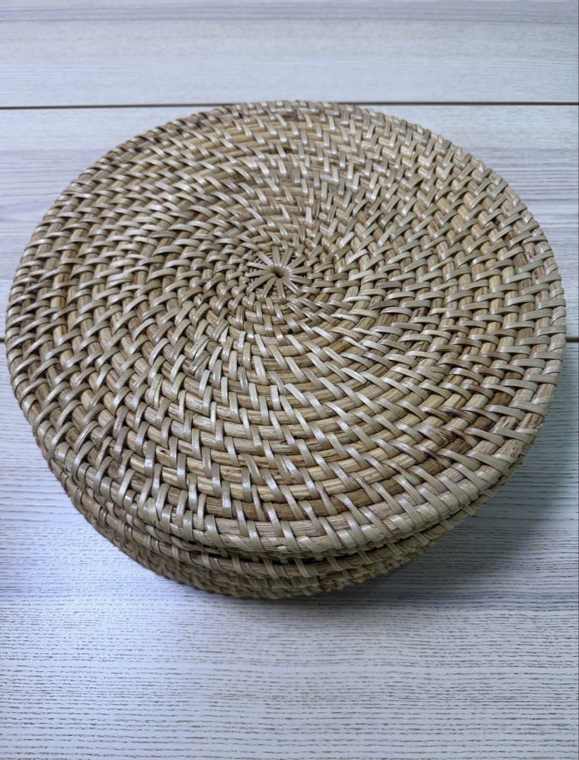 Round Woven Rattan Charger Plates (Category: Other Kitchenware & Tableware) located in Taguig. Submitted by curatedpieces (Listing ID 1468725896, Image 2). Description: - Set of 8 rattan charger plates 14” in diameter - Material: Natural brown plant fiber tightly coiled in a spiral pattern. Expect imperfections as these are handmade. - Bought from a trade fair at a higher price - Use: Use as a charger plate for tablescaping.