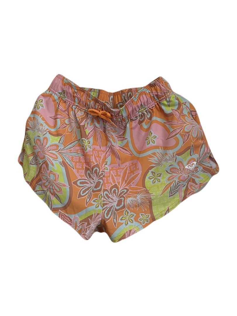 Roxy Floral Print Board Shorts Size S (Category: Shorts) located in Makati City. Submitted by nikarchives (Listing ID 1468747188, Image 2). Description: - Brand: Roxy - Used twice only - Design: Peach with multi-colored floral pattern - Size: S / P / CH / AUS S/8 - Material: Lightweight 90% polyester, 10% elastane - Features: Elastic waistband with adjustable orange drawstring, small Roxy logo near bottom hem - Origin: Made in China - Condition/U