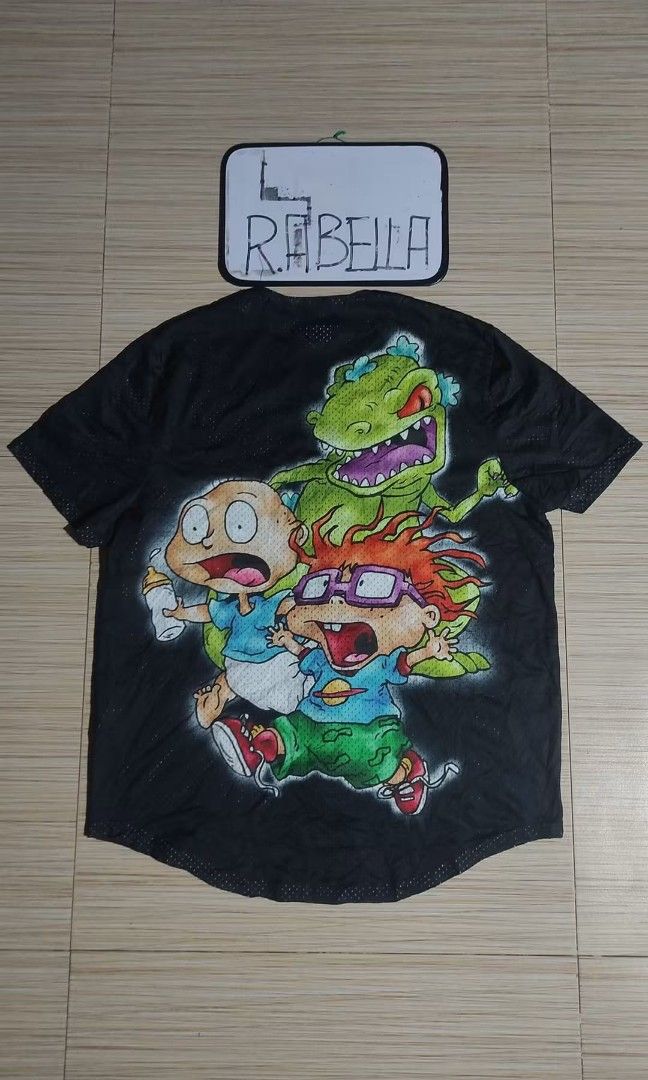 RUGRATS NICKELODEON BASEBALL JERSEY (Category: Activewear) located in Manila. Submitted by rumarabe (Listing ID 1468725087, Image 1). Description: RUGRATS X NICKELODEON BASEBALL JERSEY COMPLETE TAGS SIZE: LARGE ON TAG(23X30) IN EXCELLENT CONDITION PRICE:600 FREE SHIP(J&T) BICOL LOCATION.