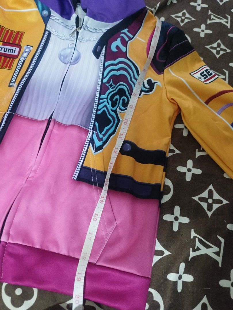 Rumi costume (Category: Babies & Kids Fashion) located in Indang. Submitted by calvincallie2526 (Listing ID 1468739647, Image 3). Description: - Kids anime character costume set take all - Includes vibrant zip-up hoodie jacket (approx. 20 inches in length) - purple braided hair - washable purple colored hair clay - Perfect for halloween.