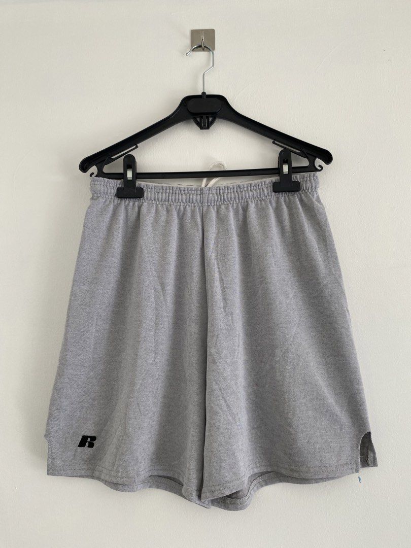 Russell Athletic Grey Sweatshorts Size L (Category: Shorts) located in Talavera. Submitted by hansnoel (Listing ID 1468759804, Image 1). Description: - Brand: Russell Athletic - Size: Large (Made in Mexico) - Color: Grey with embroidered black 'R' logo - Material: 69% polyester, 31% cotton blend - Features: Elastic waistband with drawstring, side slit hem design - Care: Machine washable - Perfect for gym, running, or lounge wear - DM for measurem