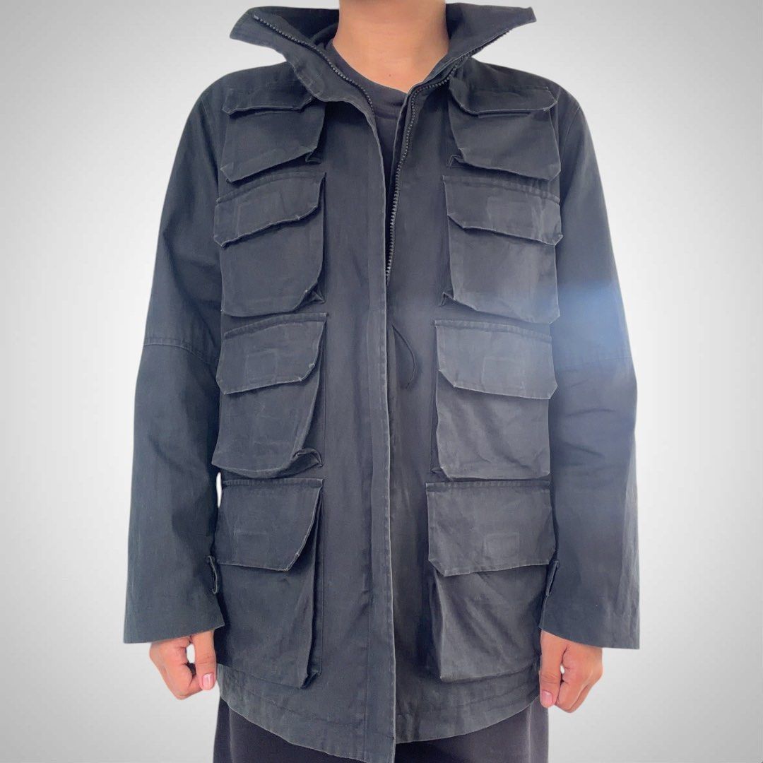 Ryuichiro Shimazaki Military Parasite Cargo Jacket (Category: Coats, Jackets and Outerwear) located in Zamboanga. Submitted by the.angura.store (Listing ID 1468722837, Image 3). Description: Ryuichiro Shimazaki Military Parasite Cargo Jacket 90’s Ryuichiro Shimazaki Parasite Field Cargo Jacket, features striking eight-pocket front grid with concealed front fastening, a high protective stand collar. 2-zipper closure that can be styled in multiple 