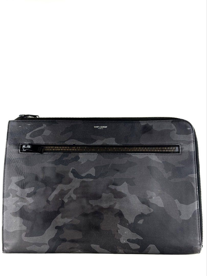 SAINT LAURENT Ride Camouflage Clutch (Category: Luxury Bags & Wallets) located in Manila. Submitted by luvluxe.mnl (Listing ID 1468775017, Image 1). Description: Medium to large size Perf for your documents Made of calfskin Can be unisex With minimal signs of use as seen on the pictures— but overall in very good condition Still presentable; no functionality issue Soo nice!! Rare find! Being sold on other resellers site online for 300$ or 18k+ php