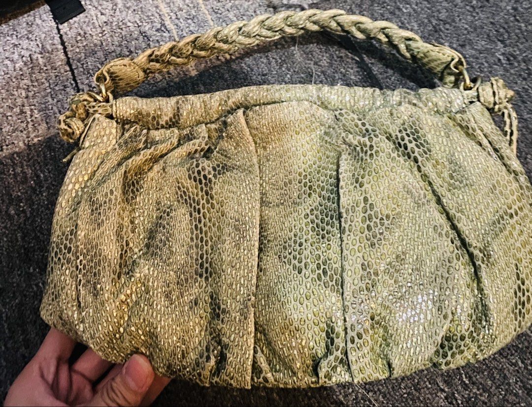 Salad Green Snakeskin Pattern Shoulder Bag Handbag (Category: Shoulder Bags) located in Baguio. Submitted by littlebitspicyy (Listing ID 1468718499, Image 2). Description: - Brand: Salad - Color/Texture: Green snakeskin texture - Hardware: Gold-tone with front metal brand logo plate - Design: Stylish braided handle and trendy gathered ruching along the top and sides - Size: Compact and lightweight, perfect grab-and-go bag for daily use and outing
