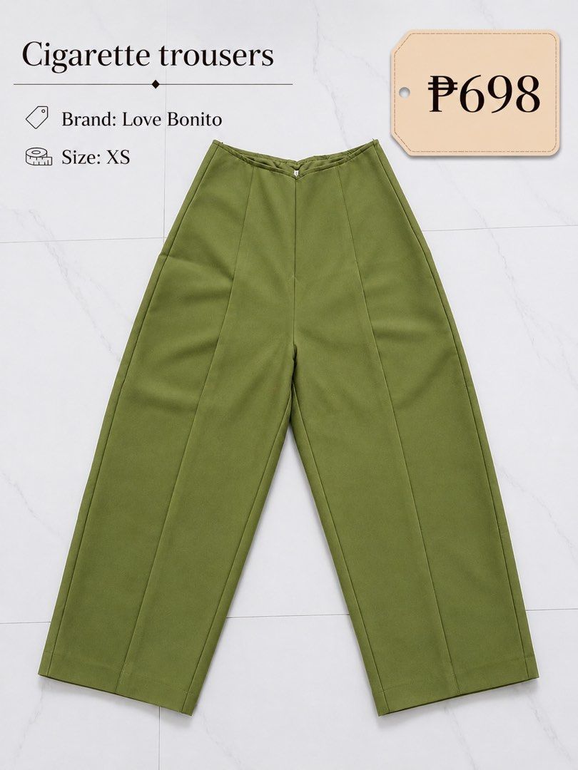 SALE! Get ₱450 each (Category: Jeans) located in Quezon City. Submitted by poshforward (Listing ID 1468742209, Image 3). Description: - Brand: Mango - Style: Straight trousers with a classic plaid pattern - Size: S (fits true to size) - Colors: Neutral tones of blue, brown, and black - Fit: Tailored with clean lines - Versatility: Easy to match with basic tops and blouses - Condition: Well-maintained and ready to wear.