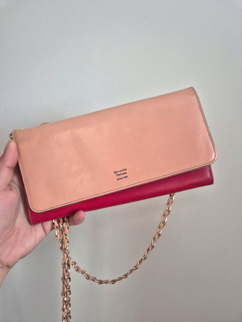 Samantha Thavasa (Category: Purses & Pouches) located in Manila. Submitted by mommynurse (Listing ID 1468748535, Image 1). Description: two-tone pink and red leather chain wallet or mini crossbody bag branded with Samantha Thavasa.